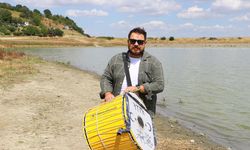 Gölette davul çalarak tasarruf çağrısı yaptı